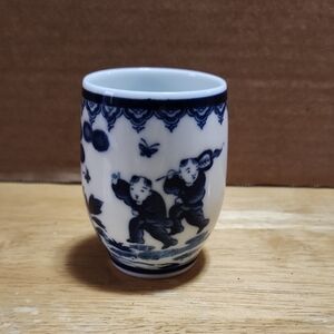 Blue and White Porcelain Art Cup with Playful Children Motif